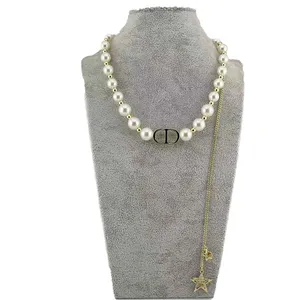 گردنبند زنانه مدل مرواریدی با آویز زنجیر و ستاره