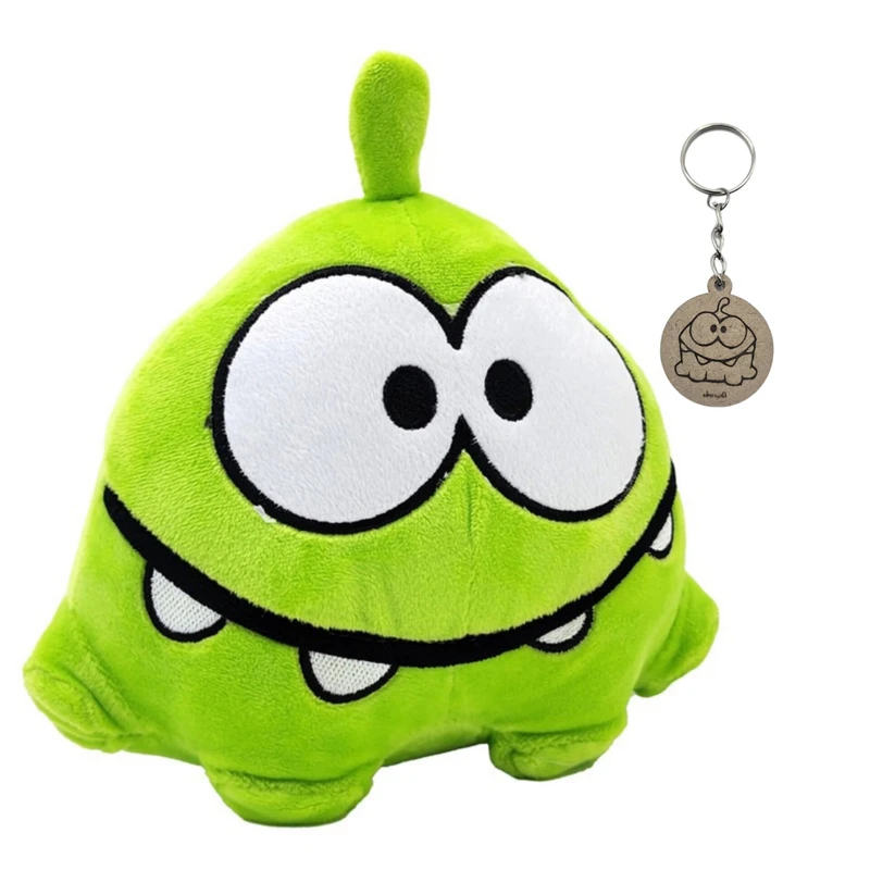 عروسک پولیشی ناب سل طرح اوم نوم ارتفاع 20 سانتی متر به همراه جاکلیدی