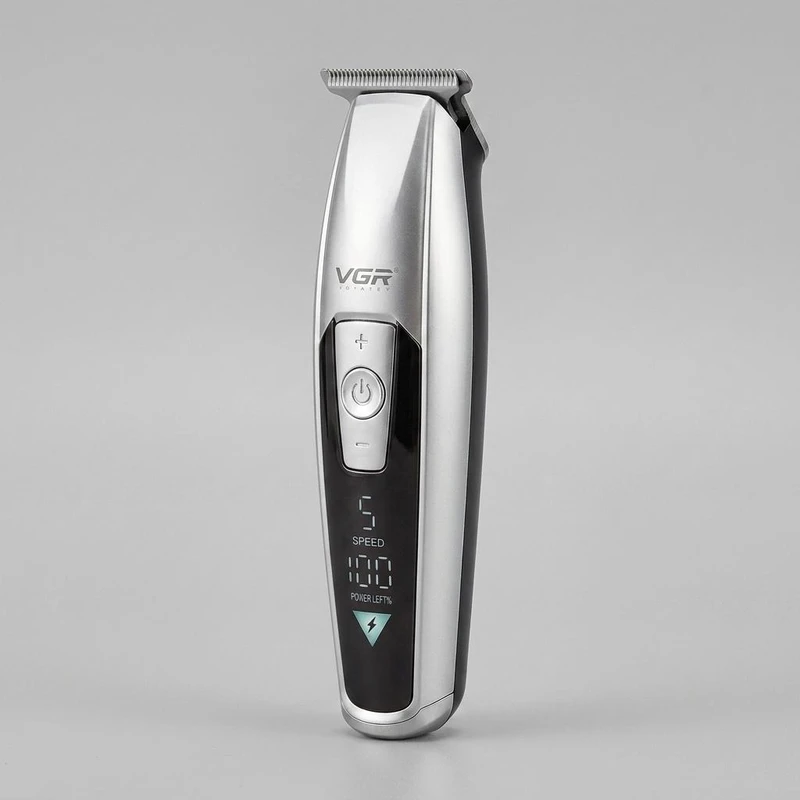 ماشین اصلاح موی سر و صورت وی جی ار مدل V-970 با تیغه استیل ضد زنگ، باتری قابل شارژ با 240 دقیقه استفاده، 5 سرعت قابل تنظیم، طراحی ارگونومیک و 3 شانه تنظیم طول 2، 3 و 4 میلی‌متر