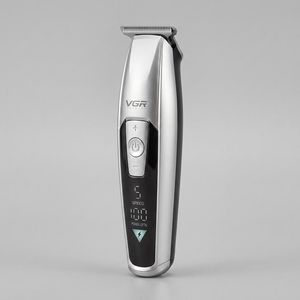 ماشین اصلاح موی سر و صورت وی جی ار مدل V-970 با تیغه استیل ضد زنگ، باتری قابل شارژ با 240 دقیقه استفاده، 5 سرعت قابل تنظیم، طراحی ارگونومیک و 3 شانه تنظیم طول 2، 3 و 4 میلیمتر