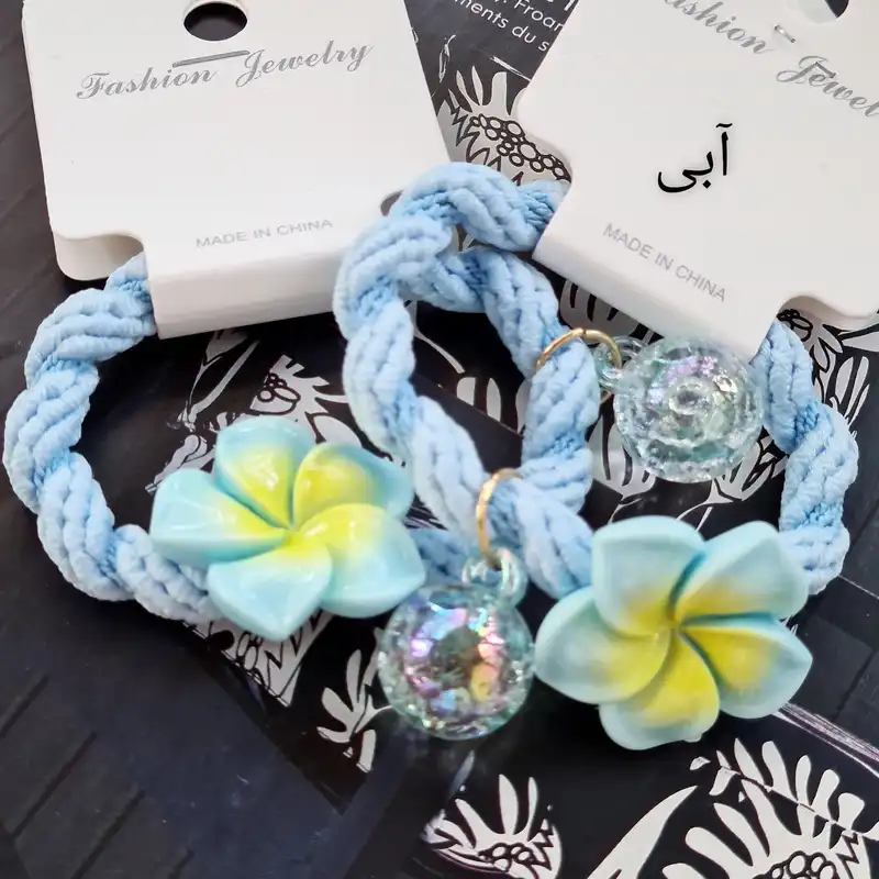 کش مو زنانه مدل گل پلومریا