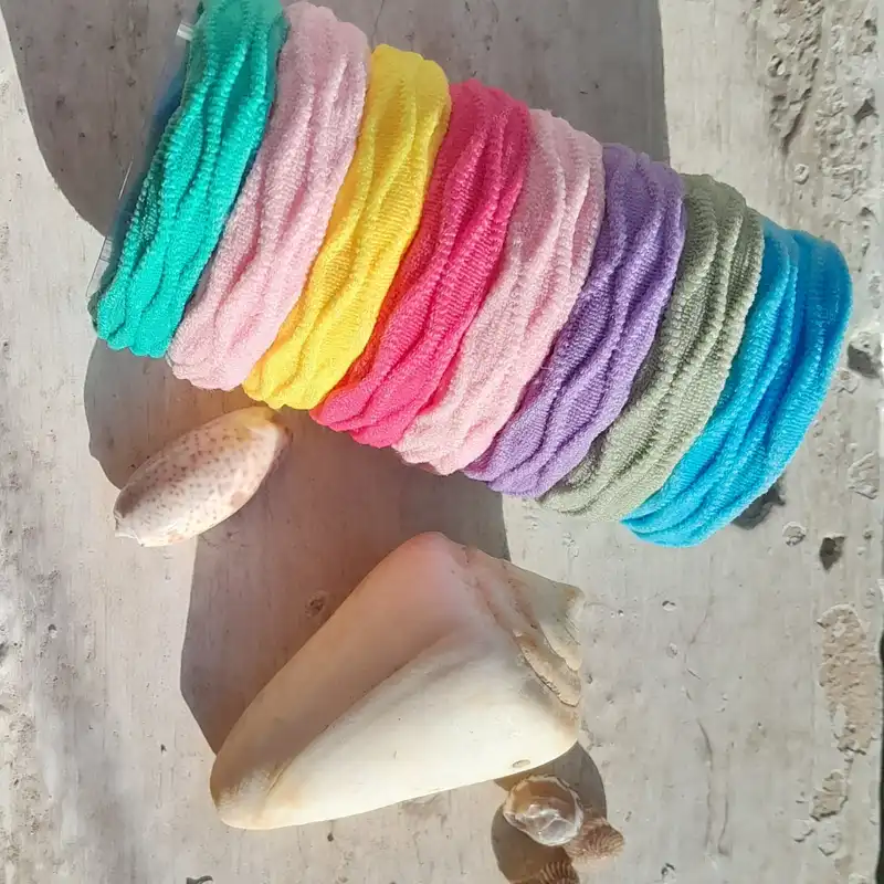 کش مو زنانه مدل حوله ای طرح مارپیچ پاستلی کد ngr332