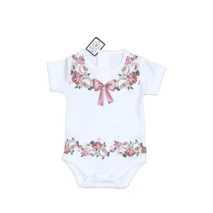 بادی آستین کوتاه نوزادی برگ سبز مدل پاپیون گلدار