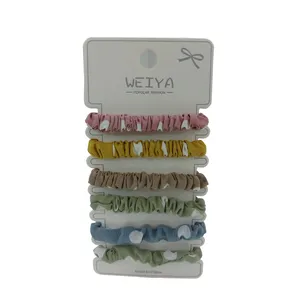 کش مو زنانه مدل فانتزی خال دار پارچه ای بسته 6 عددی