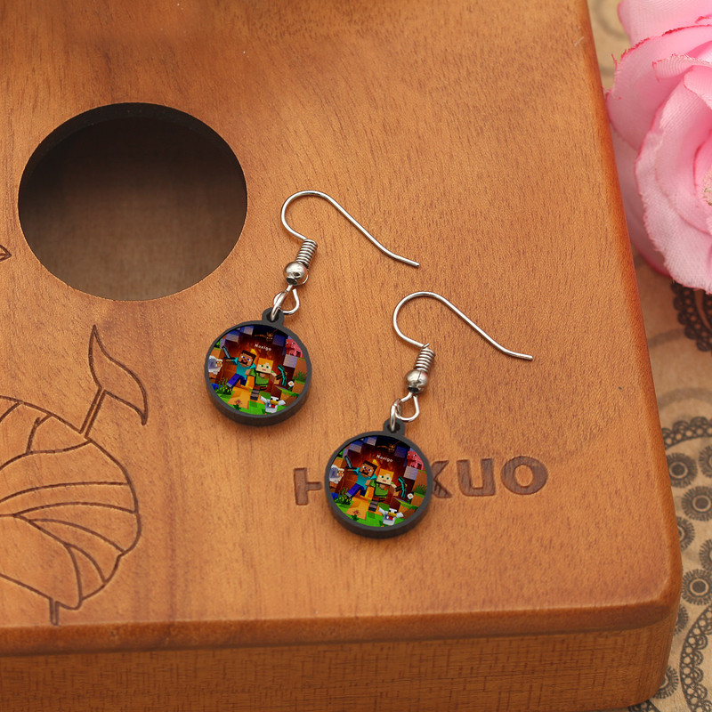 گوشواره زنانه ناکسیگو مدل شب تاب طرح ماینکرفت کد ES8454