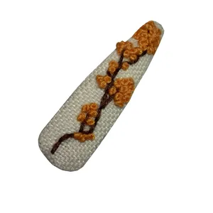 گیره مو زنانه مدل شکوفه پاییزی 01