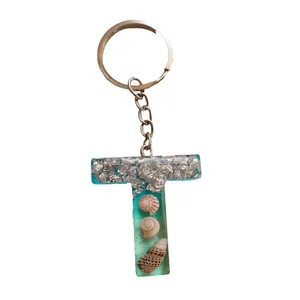 جاکلیدی مدل حرف T صدف و ورق نقره