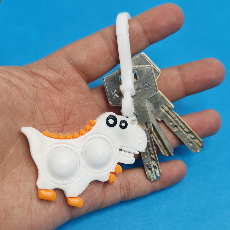 جاکلیدی دخترانه مدل سیلیکونی پاپیت طرح دایناسور تیرکس جاکلیدی دخترانه مدل سیلیکونی پاپیت طرح دایناسور تیرکس