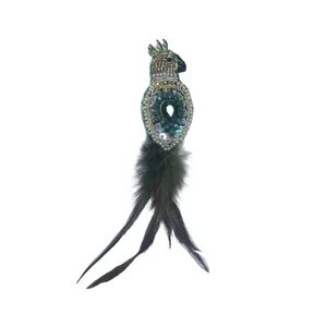 گل سینه زنانه مدل طاووس