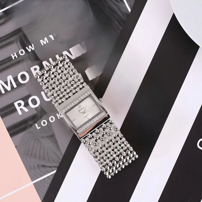 ساعت مچی عقربه ای زنانه ریلی مدل پهن کد 01 - - 2