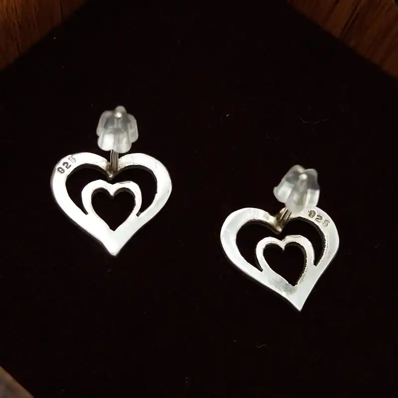 گوشواره نقره زنانه مدل قلب تو در تو