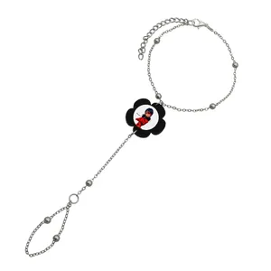 دستبند زنانه ناکسیگو مدل تمیمه طرح دختر کفشدوزکی کد TM11147