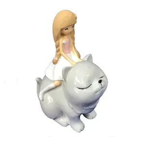 مجسمه دنیا دکوری سرمد مدل فانتزی دختر و گربه