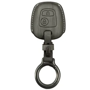 قاب ریموت و جاسوییچی خودرو چیکال مدل چرم چوب کد P-925 مناسب برای پژو 206 