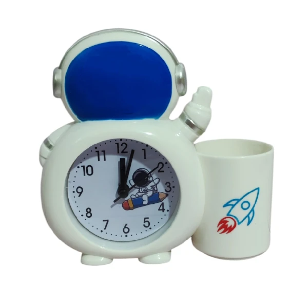 ساعت رومیزی کودک مدل آلارم دار فضانورد به همراه جاقلمی sp2