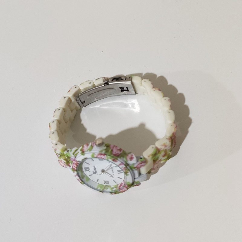 ساعت مچی عقربه ای دخترانه مدل DM 65 ساعت مچی عقربه ای دخترانه مدل DM 65