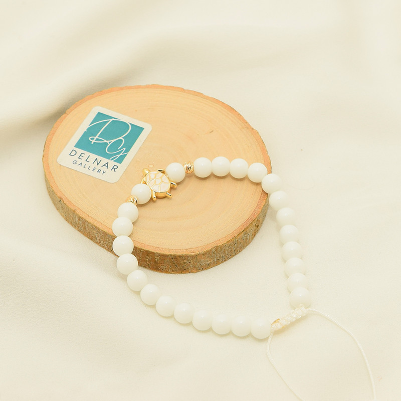 دستبند زنانه دلنار گالری مدل لاک پشت و گوی آلبرنادو دستبند زنانه دلنار گالری مدل لاک پشت و گوی آلبرنادو