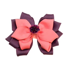 گیره مو زنانه مدل پاپیون و گل داوودی