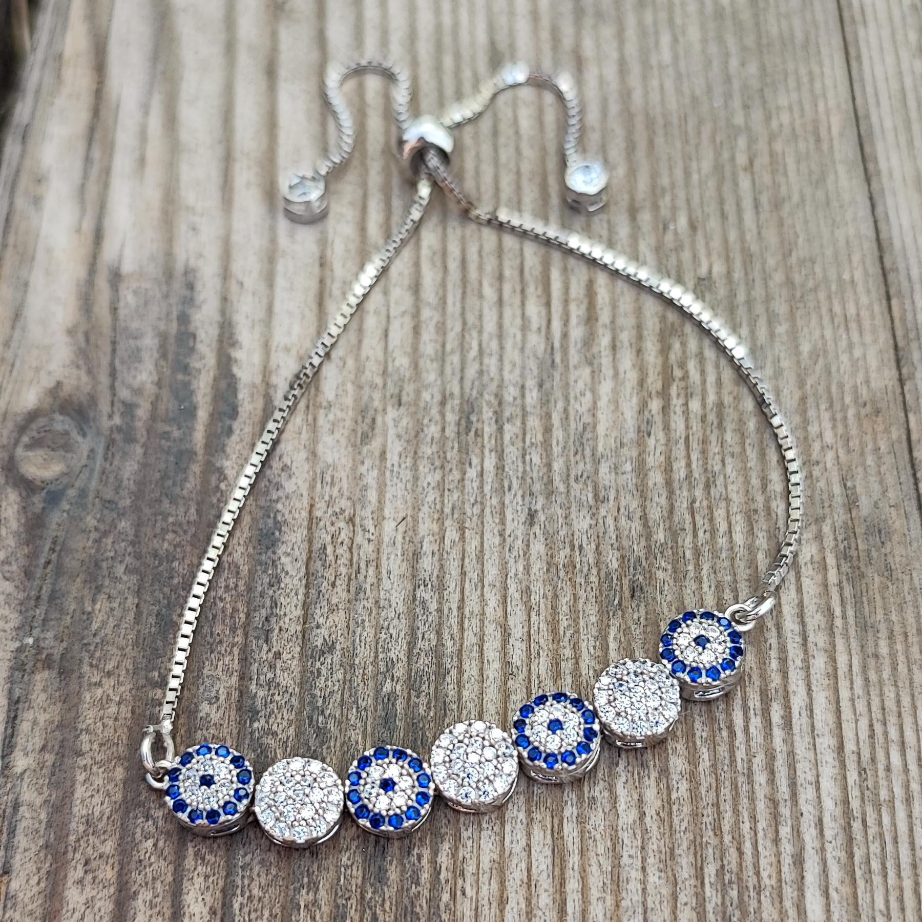 دستبند نقره زنانه مدل چشم نظر آسانسوری کد HW8071