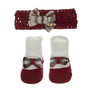 ست هدبند و جوراب نوزاد  طرح پاپیون کد 00113