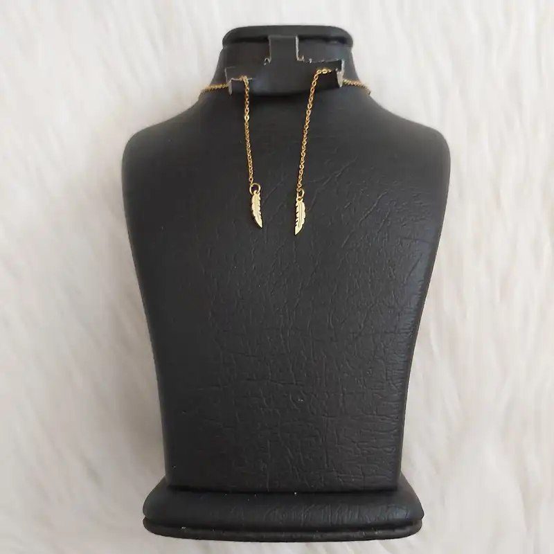 گوشواره زنانه مدل بخیه طرح پر کد r111