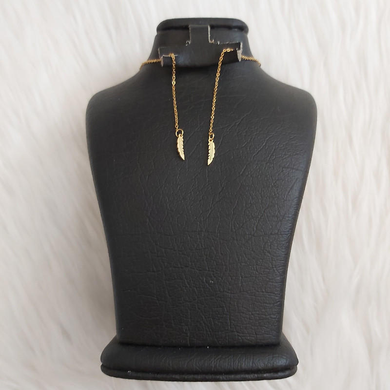 گوشواره زنانه مدل بخیه طرح پر کد r111 گوشواره زنانه مدل بخیه طرح پر کد r111