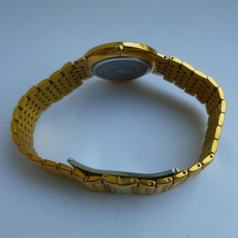 ساعت مچی عقربه‌ای مردانه کوارتز رومانسون مدل TM7238MM1RAC5B -  - 3