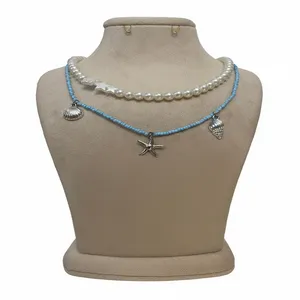 گردنبند دستساز زنانه مدل مرواریدی طرح ستاره و صدف دریایی