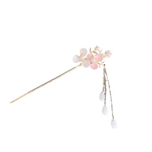 گیره مو زنانه مدل کانزاشی طرح گل شش پر