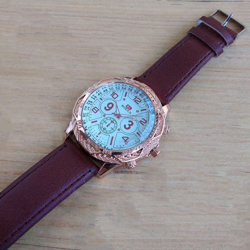 ساعت مچی عقربه ای پسرانه مدل بند چرمی کد BL54-67 ساعت مچی عقربه ای پسرانه مدل بند چرمی کد BL54-67