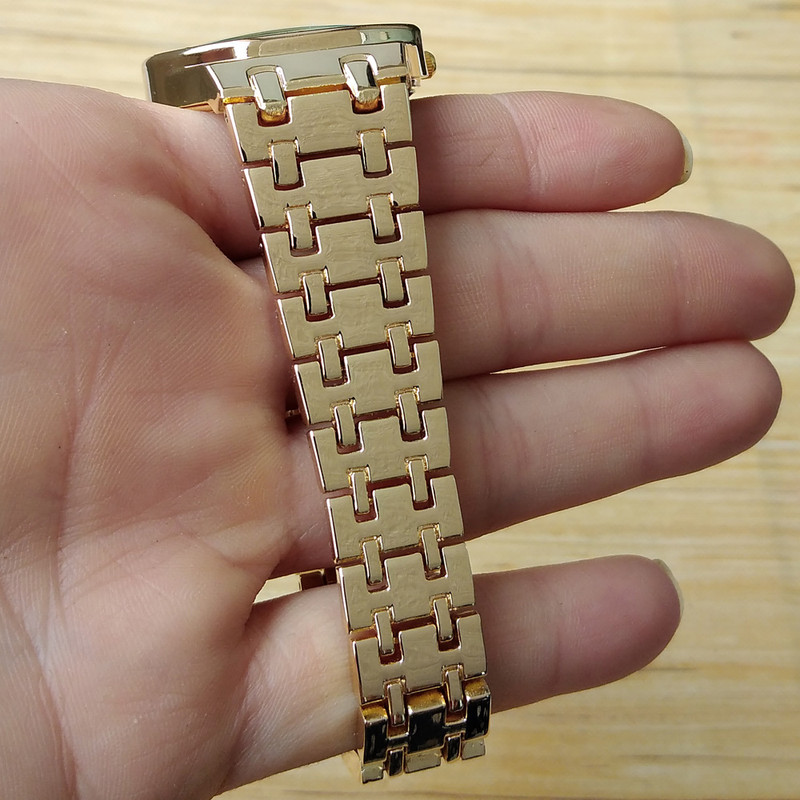 ساعت مچی عقربه ای زنانه مدل بندفلزی نگین دار کد 02 ساعت مچی عقربه ای زنانه مدل بندفلزی نگین دار کد 02