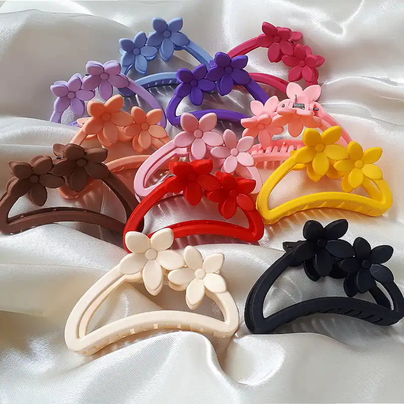 کلیپس مو زنانه مدل شمعی دو گل نگارانه