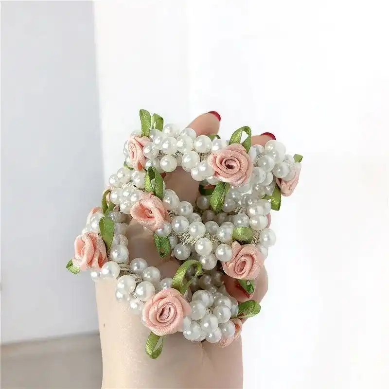 کش مو زنانه مدل مرواریدی گل دار