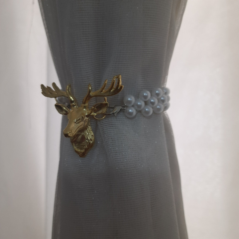 پرده جمع کن مدل گوزن