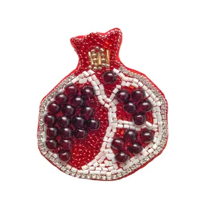 گل سینه زنانه مدل انار