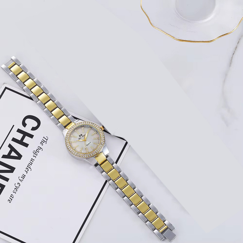 ساعت مچی عقربه ای زنانه مدل نگین دار کد 2RANG-J ساعت مچی عقربه ای زنانه مدل نگین دار کد 2RANG-J