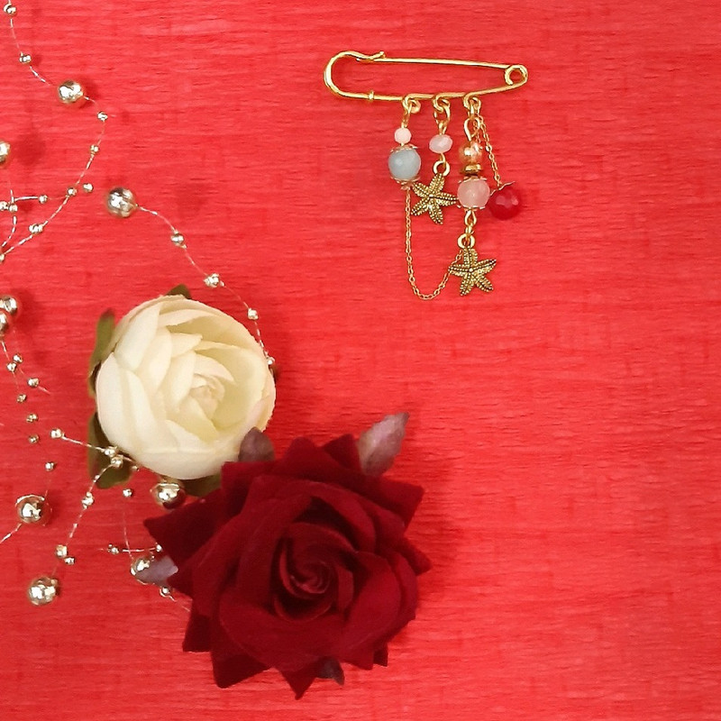 سنجاق سینه زنانه مدل ستاره دریایی کد 1486