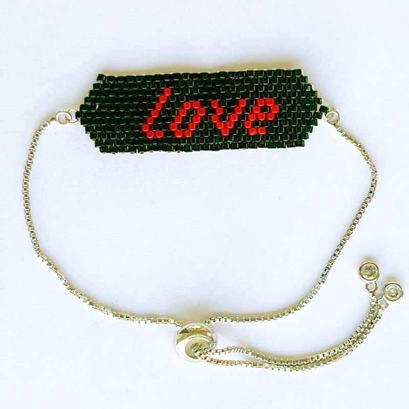 دستبند زنانه مدل پیکسلی میوکی طرح لاو با بند استیل آسانسوری