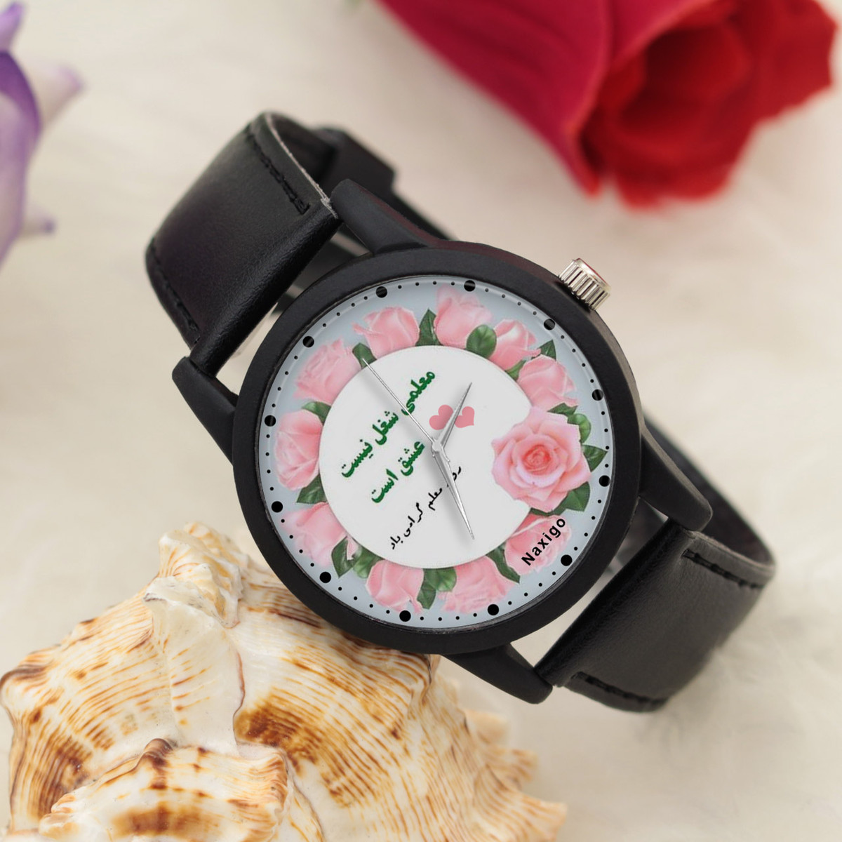 ساعت مچی عقربه ای ناکسیگو مدل روز معلم کد LF12349 ساعت مچی عقربه ای ناکسیگو مدل روز معلم کد LF12349