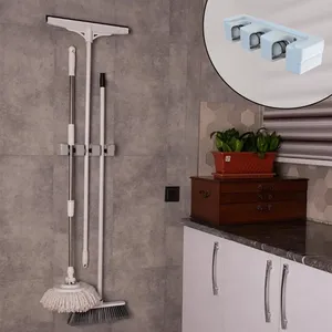 نگهدارنده جارو و تی مدل دیواری