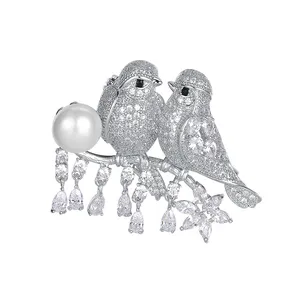 گل سینه زنانه گالری شمرون مدل پرنده کد BRC132S0