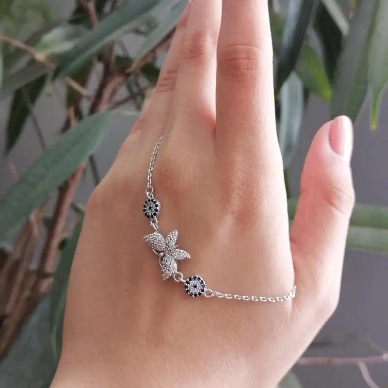 دستبند نقره زنانه مدل پروانه و چشم نظر کد HW8067