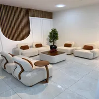 مبل راحتی هشت نفره با روکش پارچه و پایه چوب راش مدل کارنر به همراه 7 کوسن