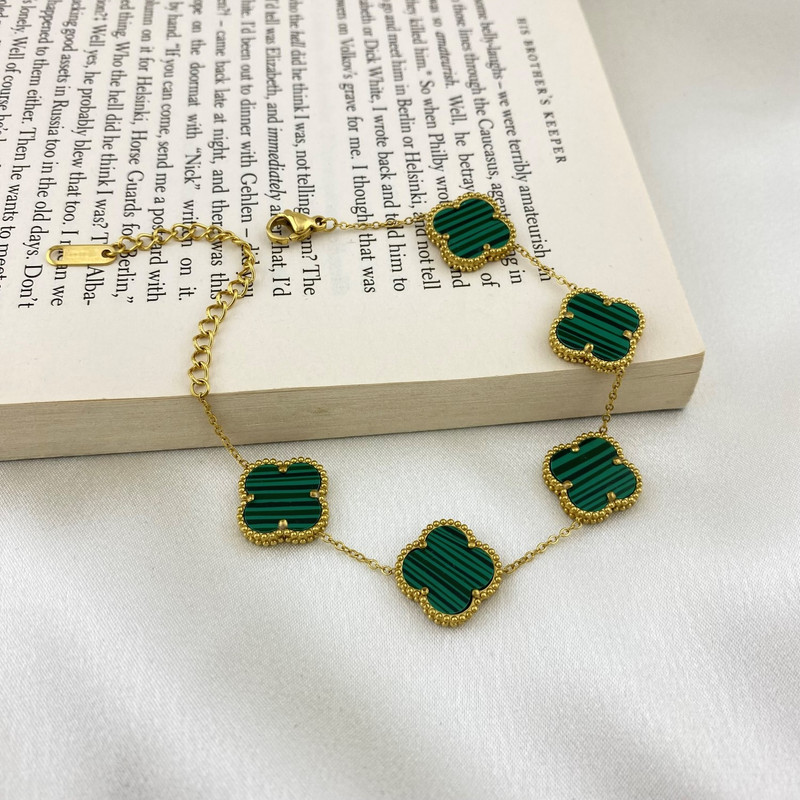 دستبند زنانه مدل گل چهارپر کد B4349