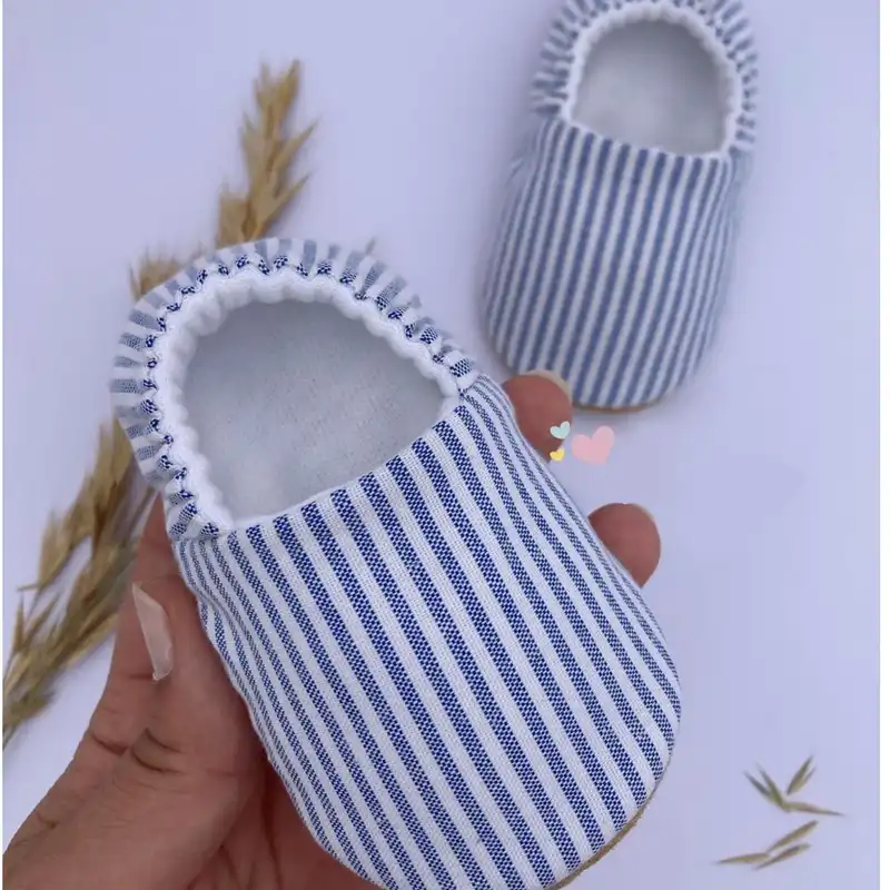 پاپوش نوزادی مدل فینگیلی همراه با کیسه جمع شو کد Ringi_00