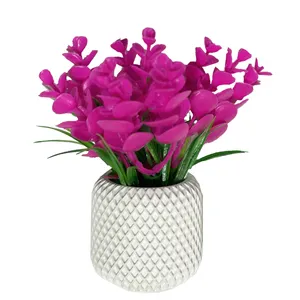 گلدان به همراه گل مصنوعی مدل تره و اکالیپتوس زنبوری