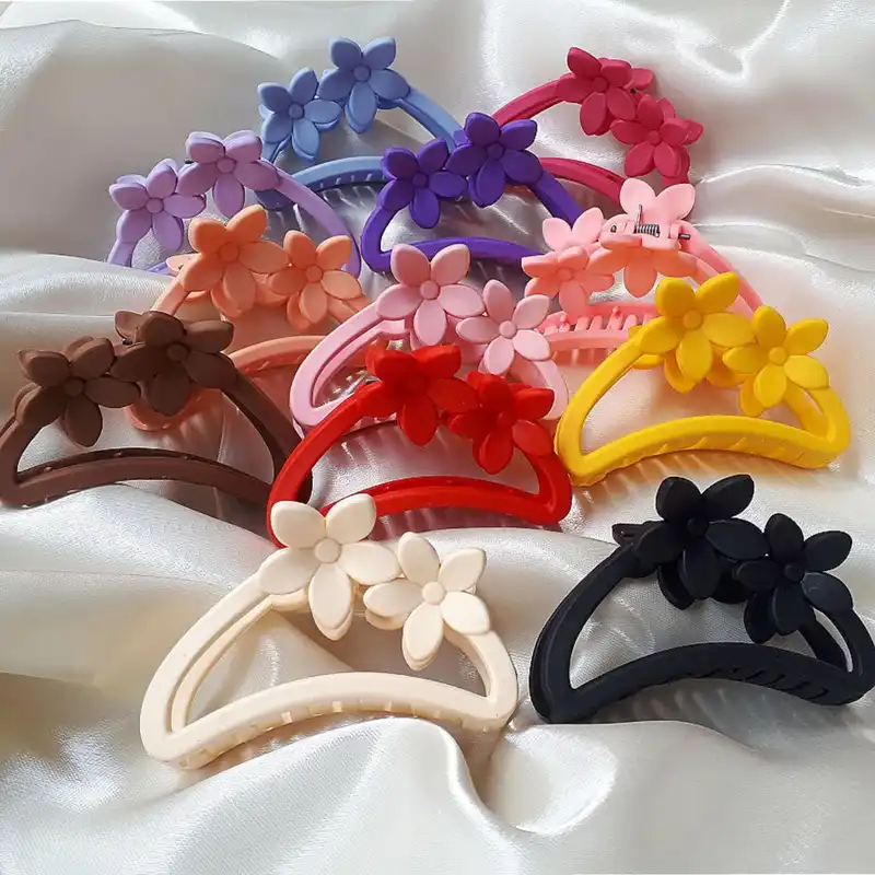 کلیپس مو زنانه مدل شمعی مات صندوقی و گلدار بسته 2 عددی