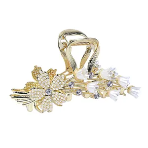 کلیپس مو زنانه مدل گلدار نگینی