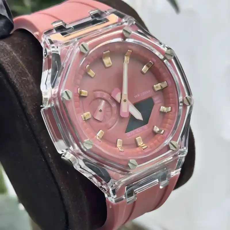 ساعت مچی عقربه ای مدل دو زمانه پمپی قاب شفاف کد golb