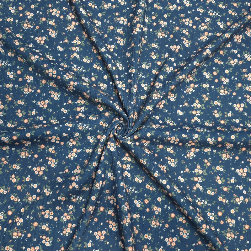 پارچه لباس عرض 1.45 متر مدل مخمل کبریتی گلریز رنگ آبی تیره